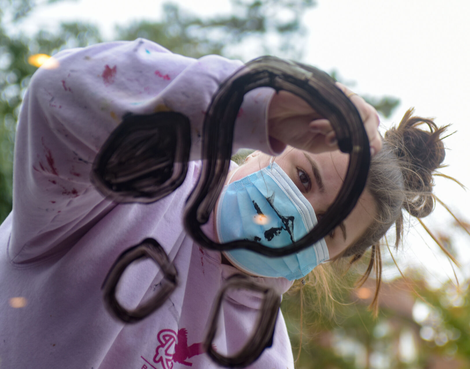 Catelyn Cambell paints a tiger paw